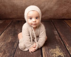 Baby sitting in Somerset photographers studio