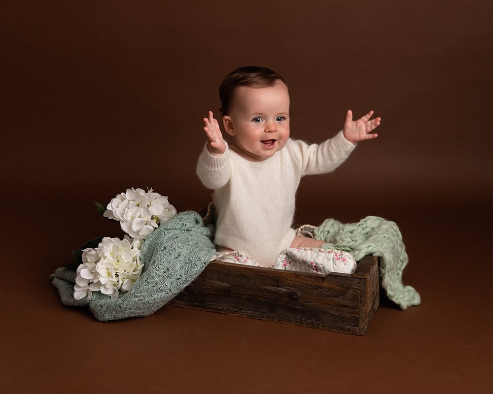 Sharon Lewis photography baby girl curled up in newborn session