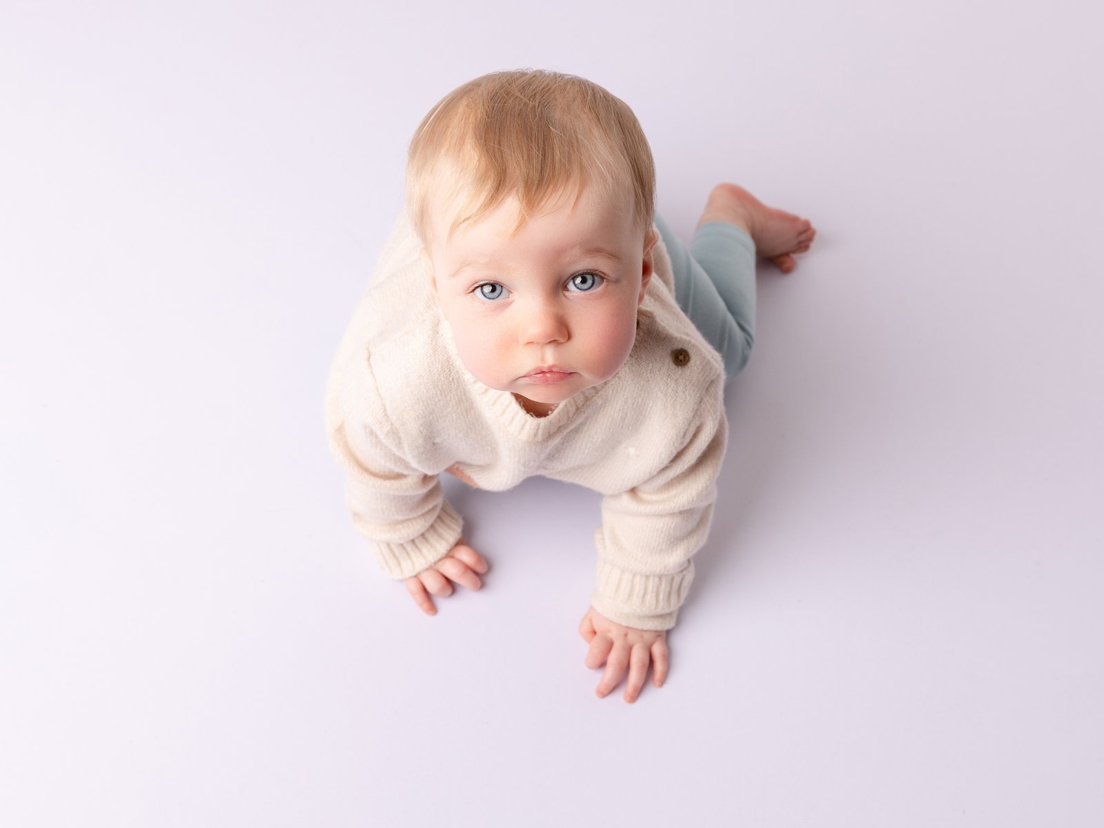 Baby crawling in photo session in Bridgwater