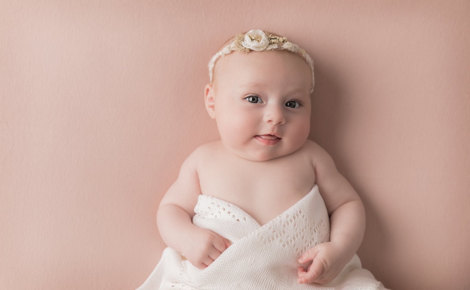 older baby girl with headband in Somerset photography studio